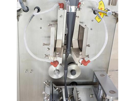 Envasadora vertical, MK-60KZ                   (Con dosificador volumétrico), bolsa de sellado en los 3 y 4 lados