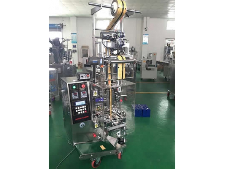 Máquina formadora, llenadora y selladora de paquetes de líquidos y pastas