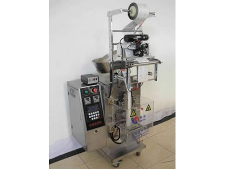 Máquina formadora, llenadora y selladora automática de paquetes de pastillas