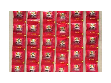 Máquina formadora, llenadora y selladora automática de paquetes de pastillas