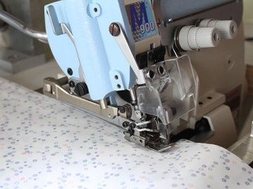 Máquina de coser y plegado automático